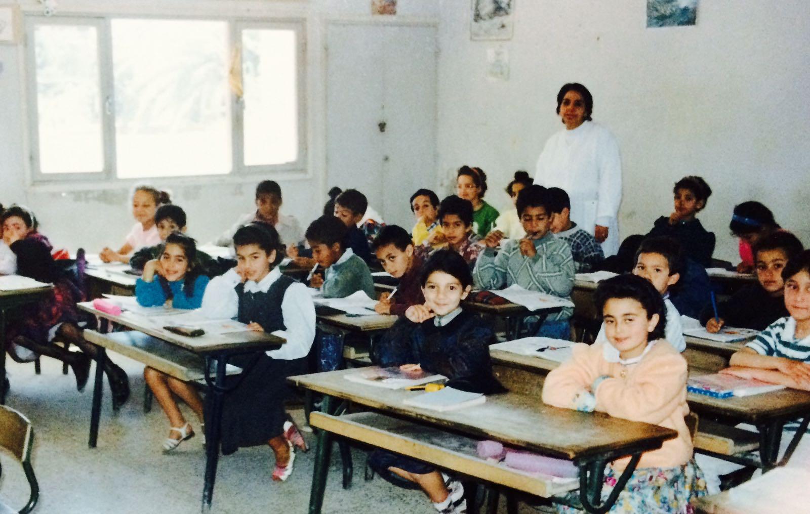 Saloua as a child in her Fes classroom