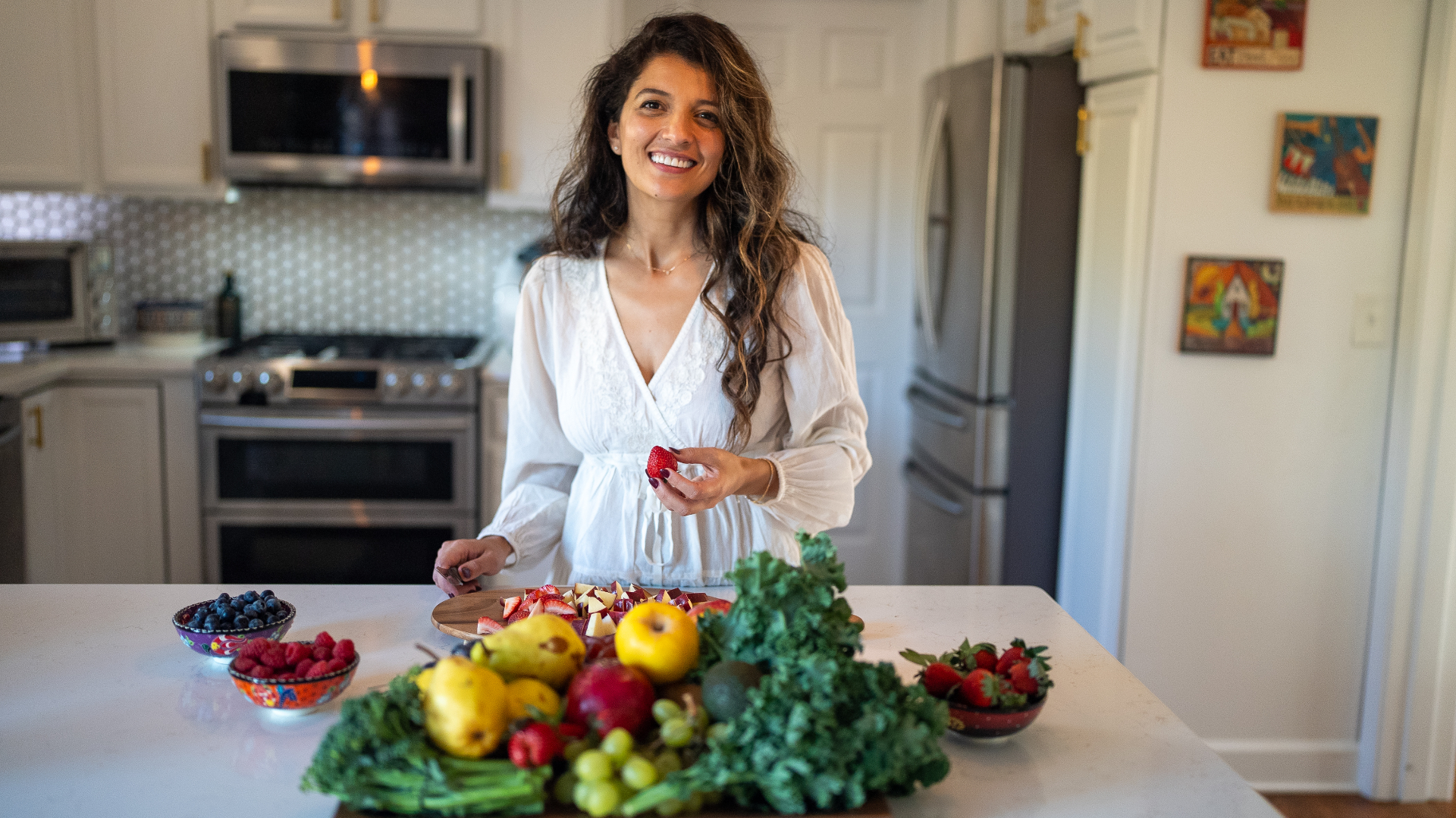 Saloua in her kitchen with whole foods